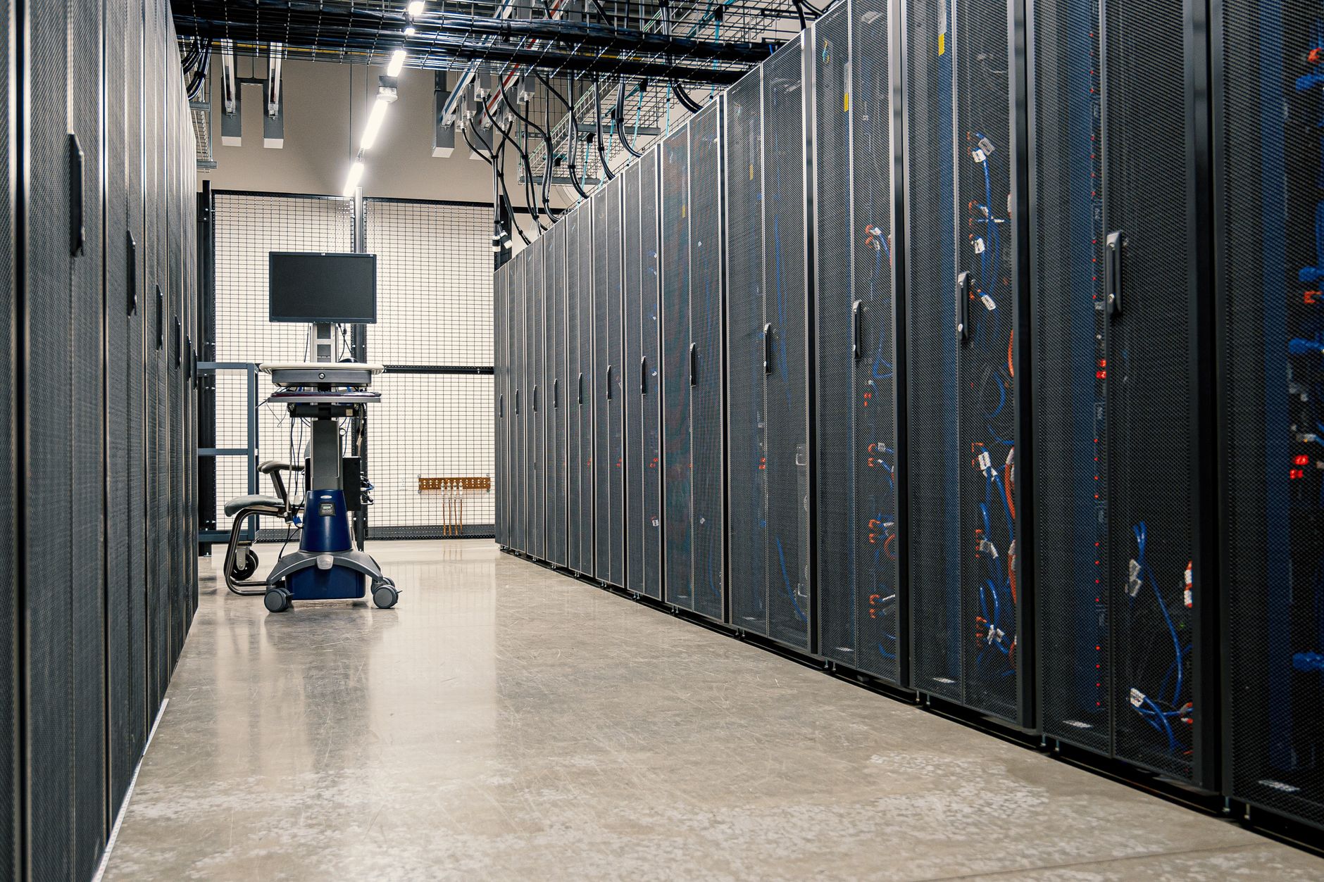 Rows of servers in a data center — though server is really a role